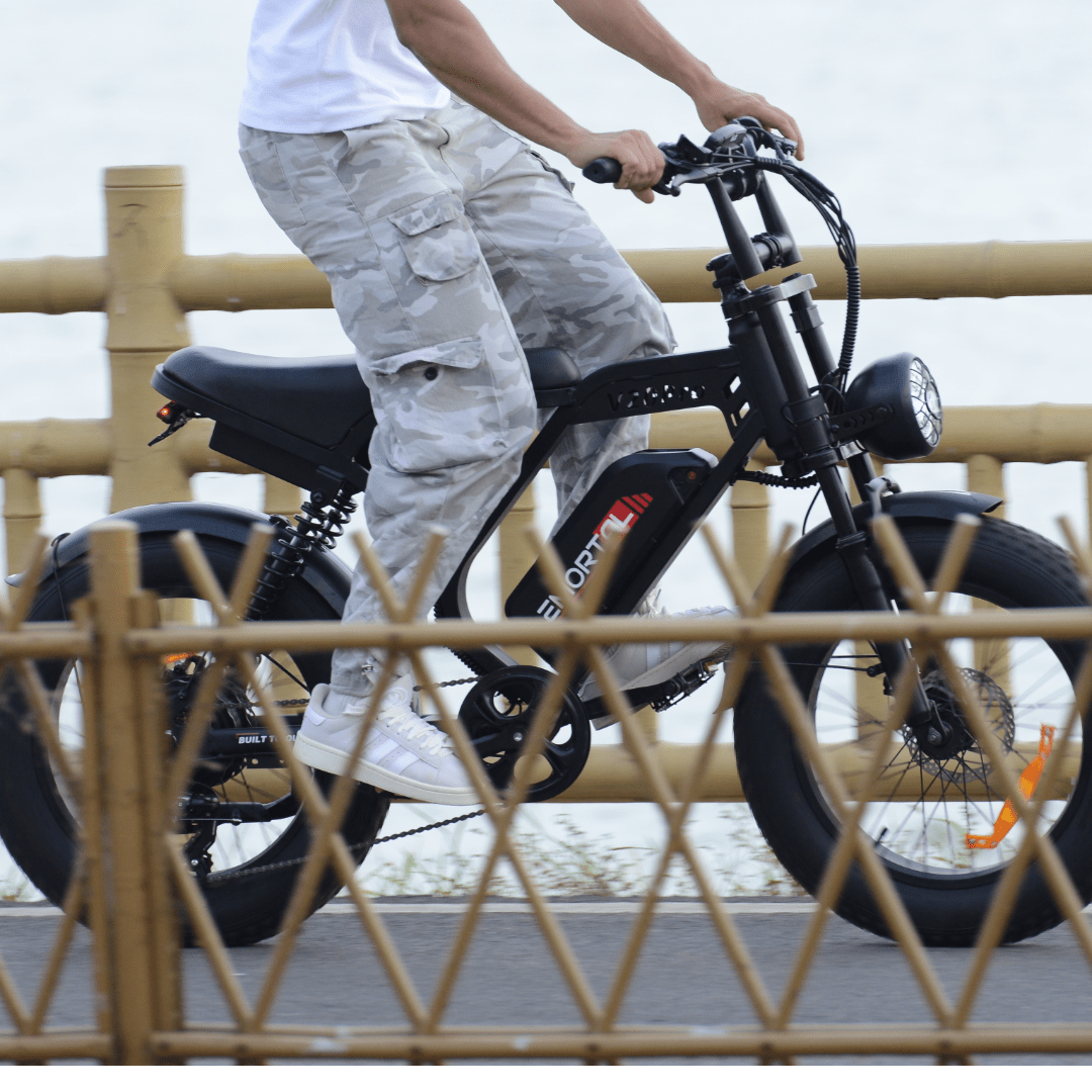 EMORTAL V20 Pro fat tire e-bike riding by seaside road | dual suspension and 48V 18.2Ah battery for long range